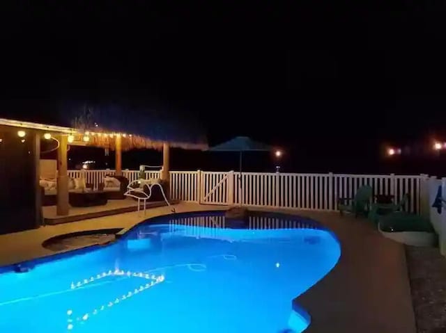 2550 SE Calais St, Port Saint Lucie, FL 34952 - view of pool at twilight
