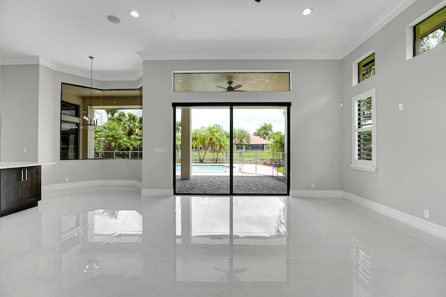 10523 Vignon Ct, Wellington, FL 33449 - empty room featuring light marble finish flooring, ornamental molding, baseboards, ceiling fan, and recessed lighting