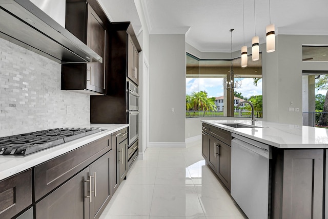 10523 Vignon Ct, Wellington, FL 33449 - kitchen featuring dishwashing machine, wall chimney range hood, stainless steel gas stovetop, backsplash, and ornamental molding