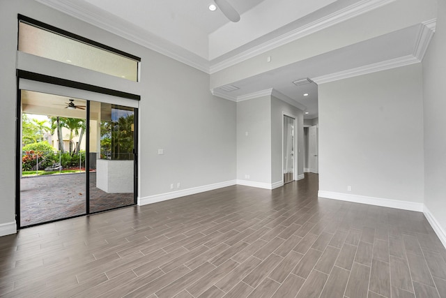 10523 Vignon Ct, Wellington, FL 33449 - spare room featuring a ceiling fan, baseboards, recessed lighting, wood finished floors, and crown molding