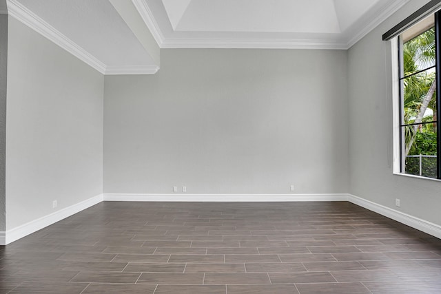 10523 Vignon Ct, Wellington, FL 33449 - spare room featuring healthy amount of natural light, ornamental molding, dark wood-style flooring, and baseboards