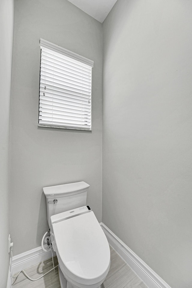 10523 Vignon Ct, Wellington, FL 33449 - bathroom with baseboards and toilet