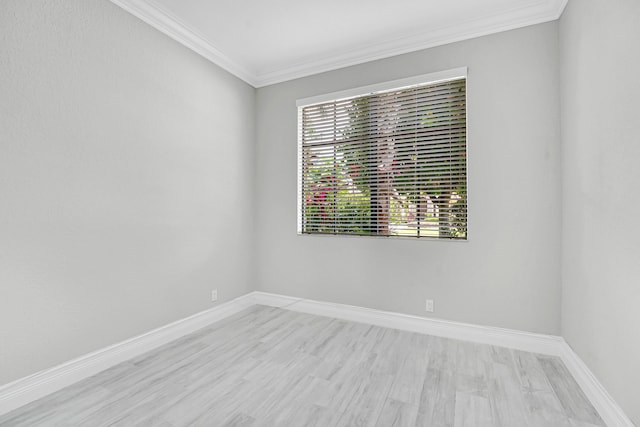 10523 Vignon Ct, Wellington, FL 33449 - spare room featuring light wood-style flooring, ornamental molding, and baseboards