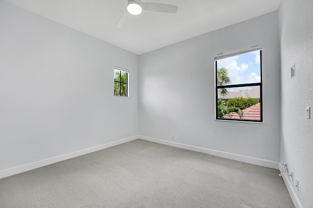 10523 Vignon Ct, Wellington, FL 33449 - carpeted spare room with a ceiling fan and baseboards
