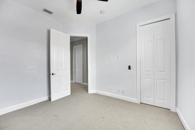 10523 Vignon Ct, Wellington, FL 33449 - unfurnished bedroom featuring light colored carpet, baseboards, a closet, and ceiling fan