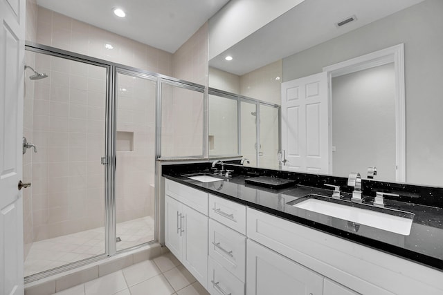 10523 Vignon Ct, Wellington, FL 33449 - full bath with double vanity, a shower stall, tile patterned flooring, and recessed lighting