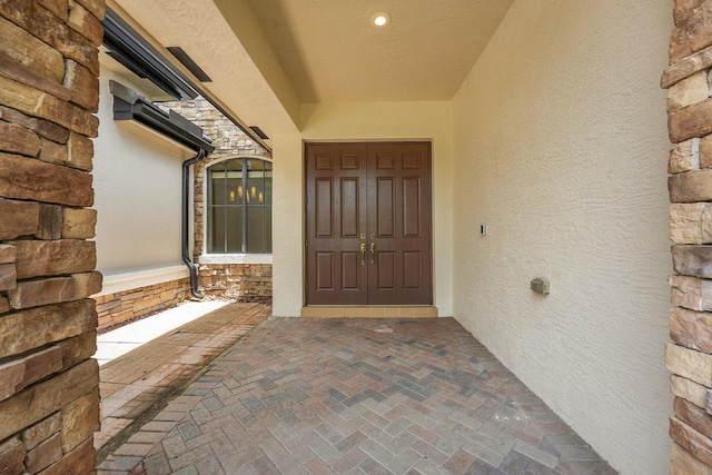 10523 Vignon Ct, Wellington, FL 33449 - entrance to property with stucco siding and stone siding