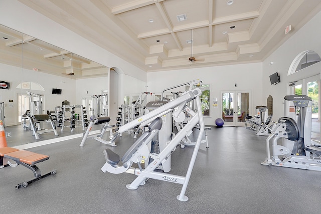 10523 Vignon Ct, Wellington, FL 33449 - workout area featuring a high ceiling, coffered ceiling, beam ceiling, arched walkways, and french doors