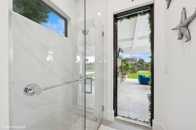 8533 N Native Dancer Rd, Palm Beach Gardens, FL 33418 - full bath featuring a marble finish shower, plenty of natural light, and beamed ceiling