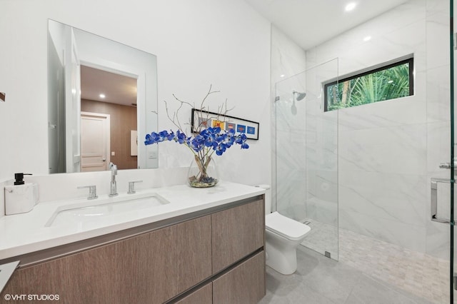 8533 N Native Dancer Rd, Palm Beach Gardens, FL 33418 - full bathroom with toilet, a marble finish shower, vanity, and recessed lighting
