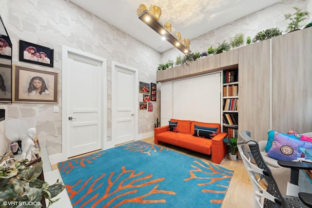 8533 N Native Dancer Rd, Palm Beach Gardens, FL 33418 - sitting room with wood finished floors