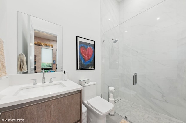 8533 N Native Dancer Rd, Palm Beach Gardens, FL 33418 - full bathroom featuring a marble finish shower, vanity, and toilet