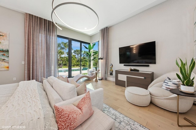 8533 N Native Dancer Rd, Palm Beach Gardens, FL 33418 - living room with wood finished floors