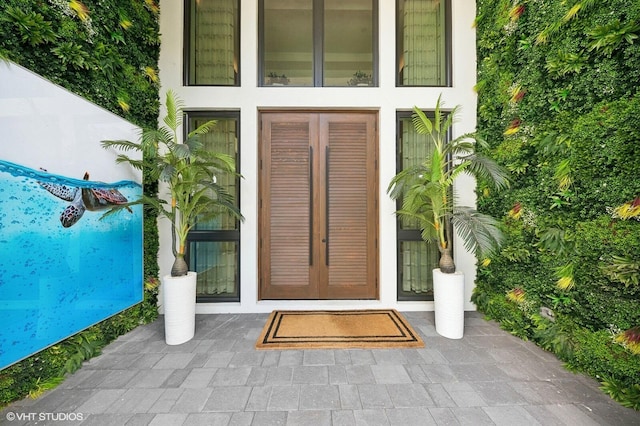 8533 N Native Dancer Rd, Palm Beach Gardens, FL 33418 - property entrance featuring french doors