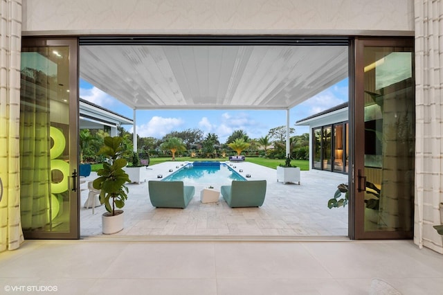 8533 N Native Dancer Rd, Palm Beach Gardens, FL 33418 - outdoor pool featuring a patio