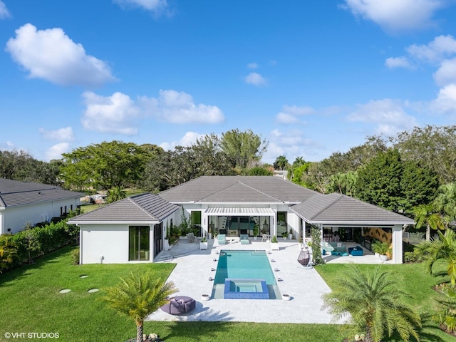 8533 N Native Dancer Rd, Palm Beach Gardens, FL 33418 - back of house with a lawn, a patio, an outdoor pool, an outdoor living space with a fire pit, and an in-ground hot tub