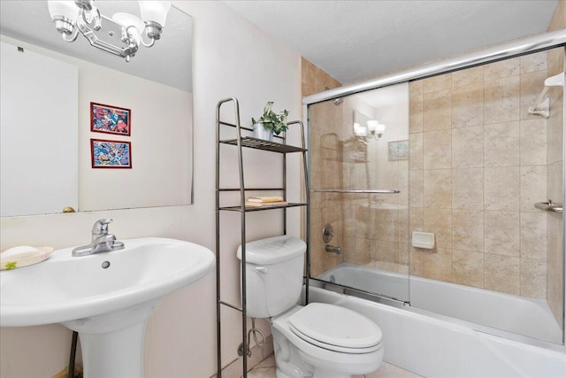 1009 N Ocean Blvd Unit 510, Pompano Beach, FL 33062 - bathroom featuring toilet, shower / bath combination with glass door, and a sink