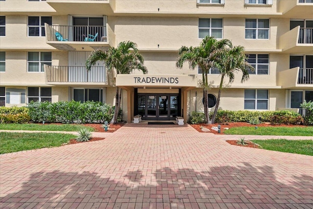 1009 N Ocean Blvd Unit 510, Pompano Beach, FL 33062 - view of apartment building / complex featuring decorative driveway