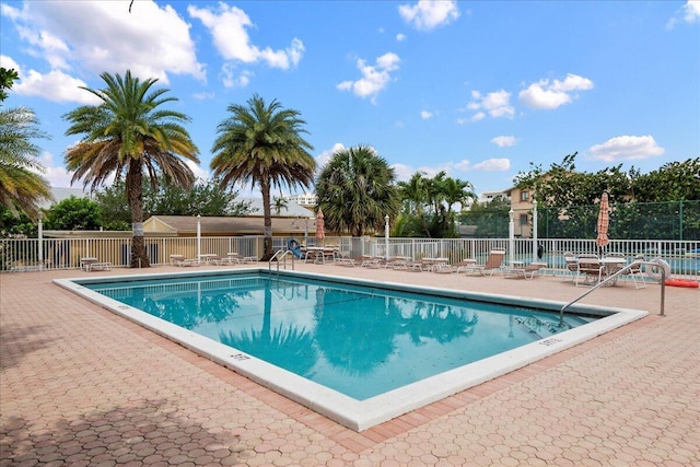 1009 N Ocean Blvd Unit 510, Pompano Beach, FL 33062 - community pool featuring a patio