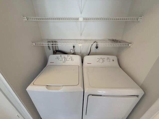 1906 Palmland Dr Unit D, Boynton Beach, FL 33436 - laundry room featuring washer and clothes dryer
