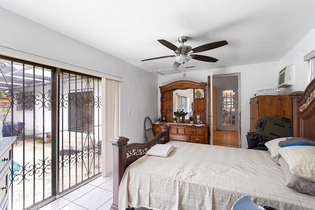 1045 NW 47th Ter, Miami, FL 33127 - bedroom with access to outside, a wall mounted AC, a ceiling fan, and tile patterned floors