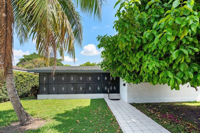 1045 NW 47th Ter, Miami, FL 33127 - view of green lawn with mail area