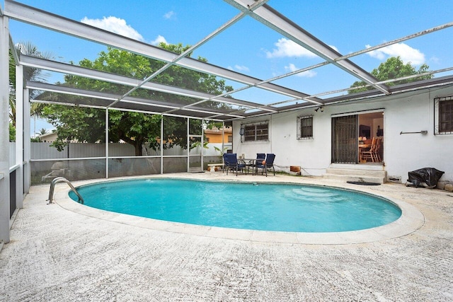 1045 NW 47th Ter, Miami, FL 33127 - view of swimming pool with a patio area and a lanai
