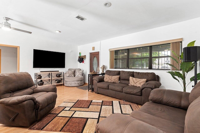 1045 NW 47th Ter, Miami, FL 33127 - living room with wood finished floors and ceiling fan