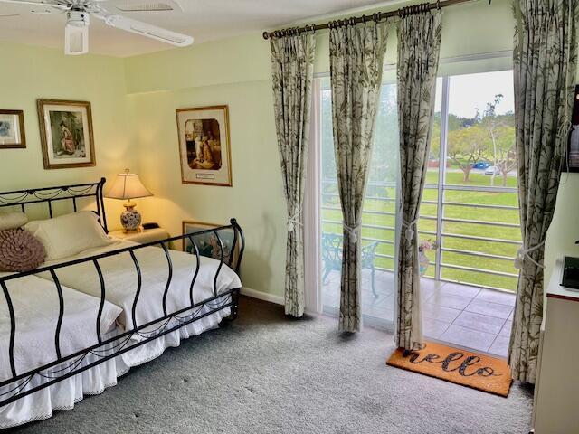 577 Mansfield N N Unit 577, Boca Raton, FL 33434 - bedroom featuring carpet and baseboards