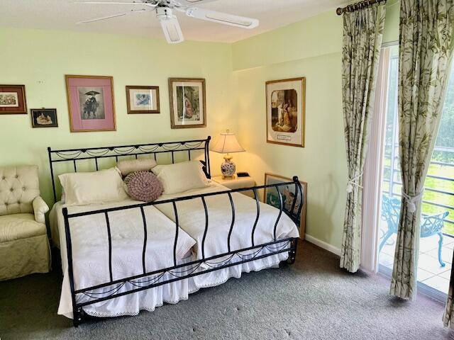 577 Mansfield N N Unit 577, Boca Raton, FL 33434 - bedroom with carpet flooring and a ceiling fan