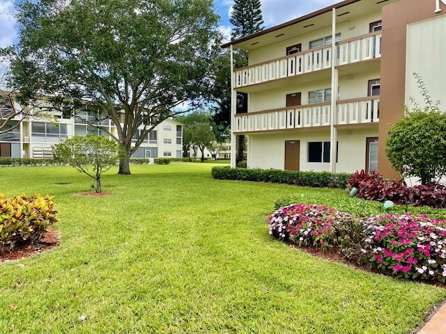 577 Mansfield N N Unit 577, Boca Raton, FL 33434 - view of green lawn