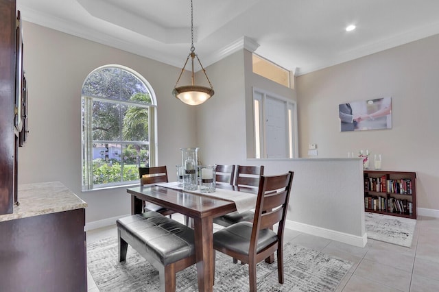 146 Magnolia Way, Tequesta, FL 33469 - dining room featuring baseboards, crown molding, light tile patterned flooring, a tray ceiling, and recessed lighting