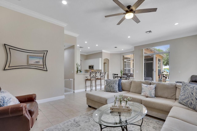 146 Magnolia Way, Tequesta, FL 33469 - living area with a ceiling fan, baseboards, light tile patterned flooring, recessed lighting, and ornamental molding