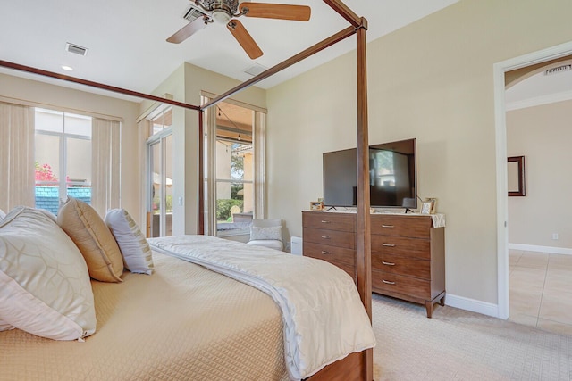 146 Magnolia Way, Tequesta, FL 33469 - bedroom featuring multiple windows, light colored carpet, baseboards, and a ceiling fan
