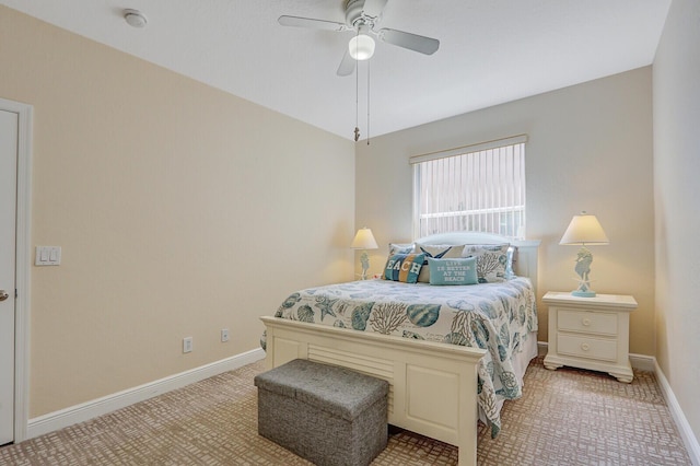 146 Magnolia Way, Tequesta, FL 33469 - bedroom with baseboards, a ceiling fan, and light carpet