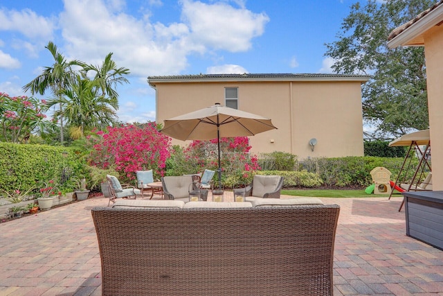 146 Magnolia Way, Tequesta, FL 33469 - view of patio featuring outdoor lounge area