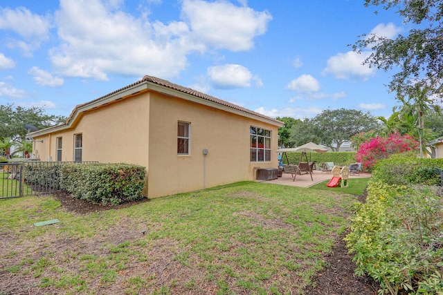 146 Magnolia Way, Tequesta, FL 33469 - back of house featuring a patio area and stucco siding