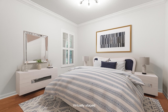 843 Niemen Dr, Palm Beach Gardens, FL 33410 - bedroom with ornamental molding, dark wood-type flooring, and baseboards