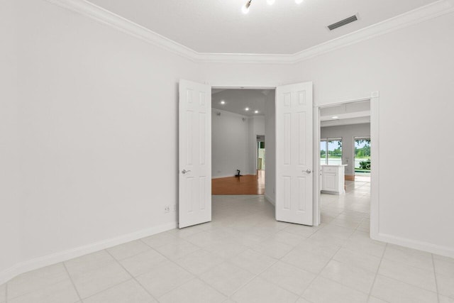 843 Niemen Dr, Palm Beach Gardens, FL 33410 - unfurnished room with crown molding and baseboards
