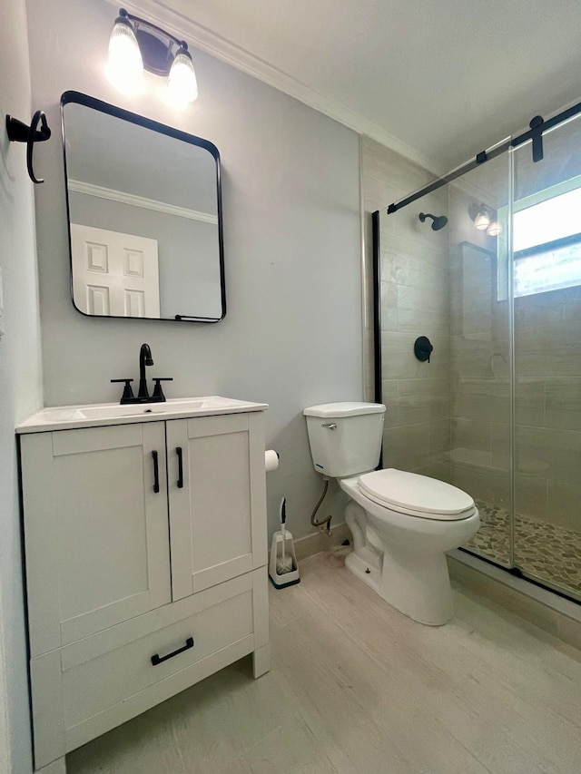4491 NW 1st Ter, Deerfield Beach, FL 33064 - full bath featuring crown molding, toilet, vanity, a shower stall, and baseboards