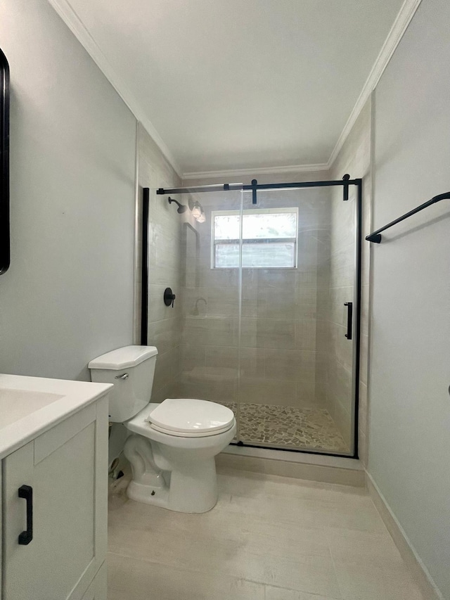 4491 NW 1st Ter, Deerfield Beach, FL 33064 - bathroom featuring crown molding, toilet, a stall shower, vanity, and baseboards