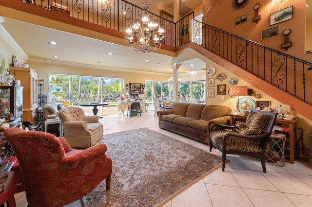 6935 Pioneer Rd, West Palm Beach, FL 33413 - living area with tile patterned floors, crown molding, a chandelier, a towering ceiling, and stairway