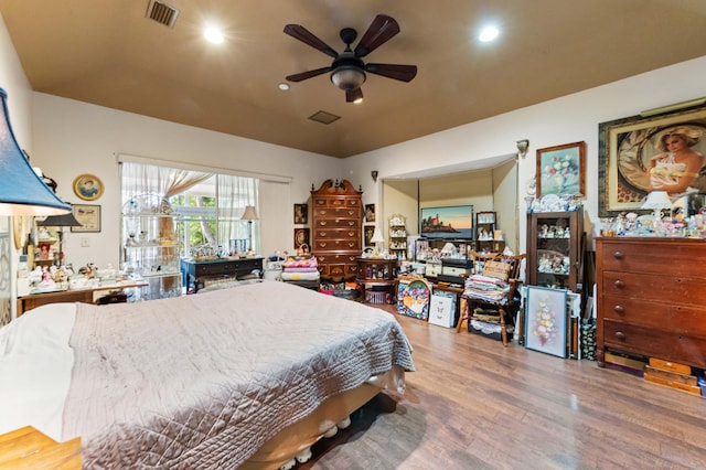 6935 Pioneer Rd, West Palm Beach, FL 33413 - bedroom featuring wood finished floors, recessed lighting, and vaulted ceiling