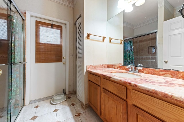 6935 Pioneer Rd, West Palm Beach, FL 33413 - full bath with a tile shower, vanity, tile patterned flooring, and a closet