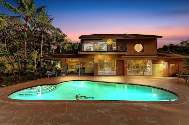 6935 Pioneer Rd, West Palm Beach, FL 33413 - outdoor pool featuring a patio area