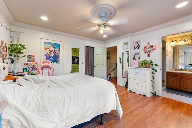 6935 Pioneer Rd, West Palm Beach, FL 33413 - bedroom with ornamental molding, light wood finished floors, ceiling fan, connected bathroom, and recessed lighting