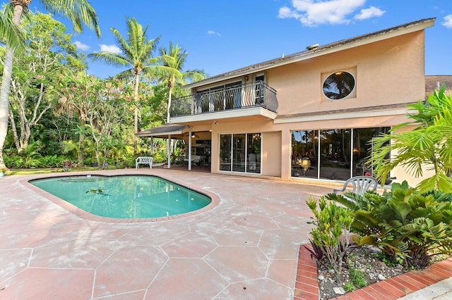 6935 Pioneer Rd, West Palm Beach, FL 33413 - swimming pool featuring a patio area