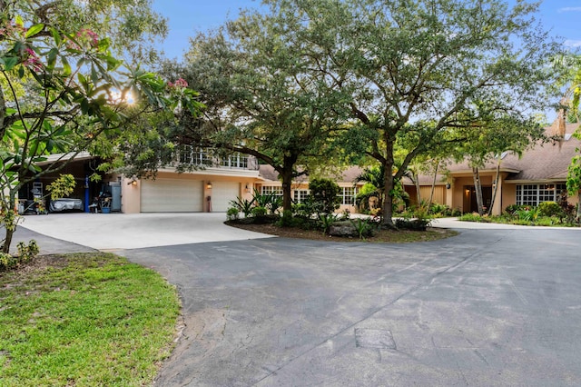 6935 Pioneer Rd, West Palm Beach, FL 33413 - view of front of property with driveway and stucco siding