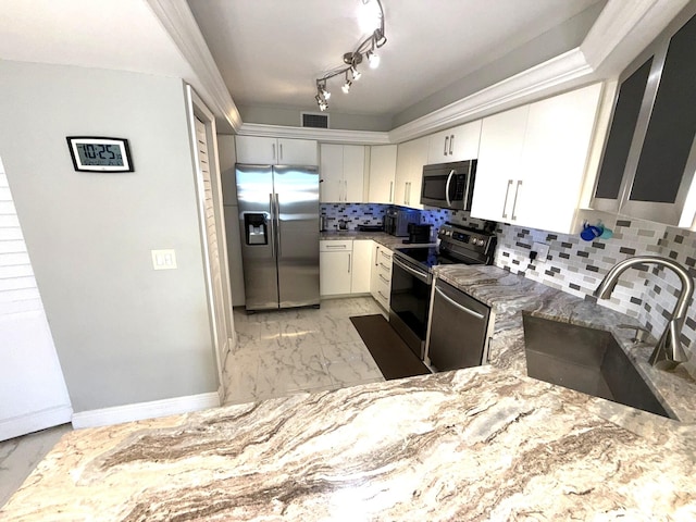 2425 Presidential Way Unit 1804, West Palm Beach, FL 33401 - kitchen featuring stainless steel appliances, a sink, light marble finish flooring, backsplash, and light stone countertops