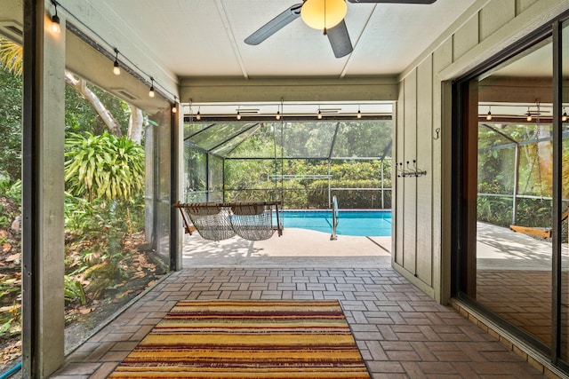 4904 River Pl, Fort Pierce, FL 34982 - unfurnished sunroom with a ceiling fan